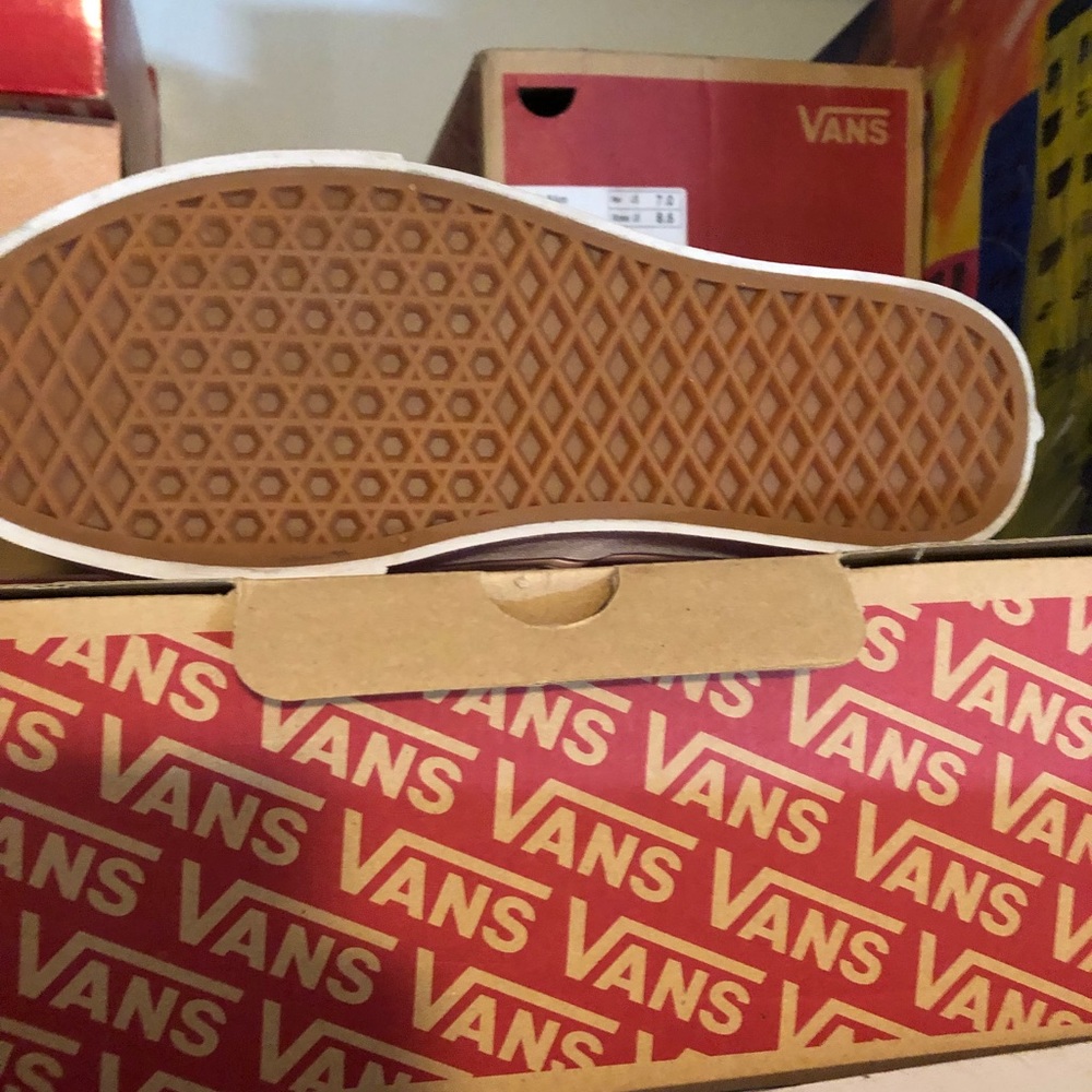 Low top checkered pink and white vans